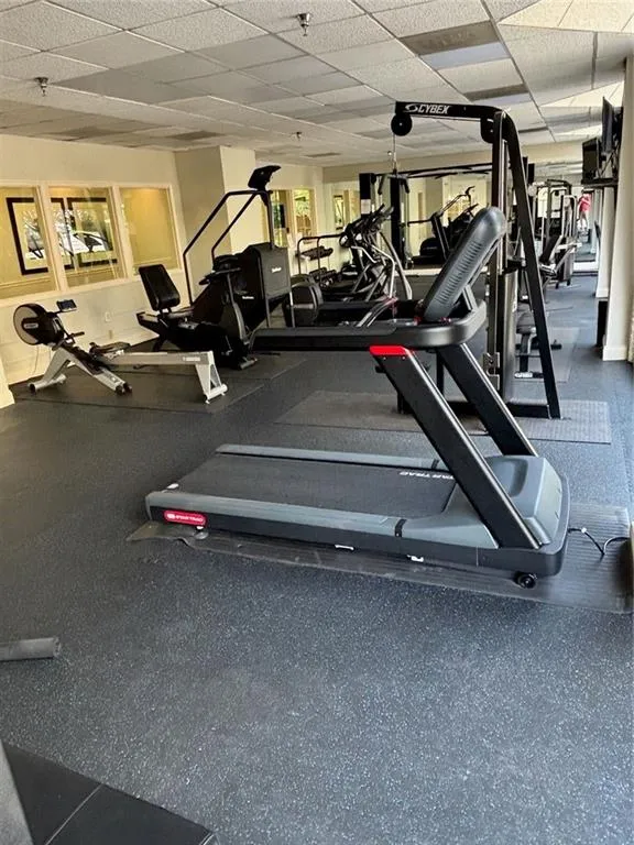 Gym featuring a paneled ceiling