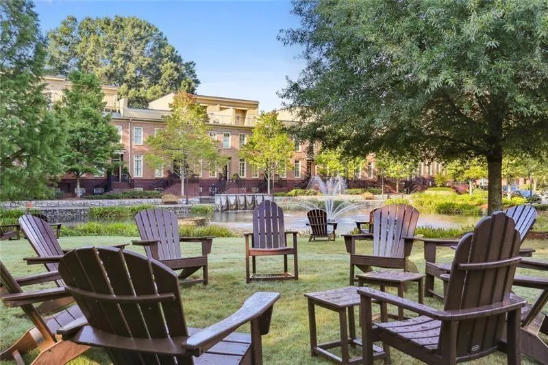 Surrounding community featuring a patio and a lawn