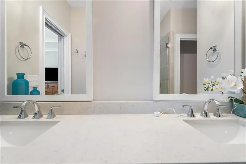 Bathroom featuring oversized vanity and double sink