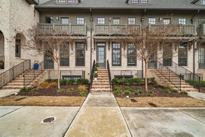 View of front of home with a balcony