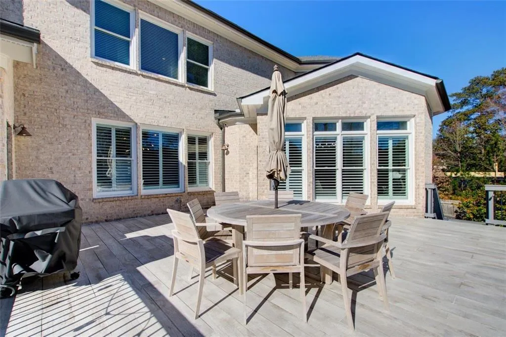 Expansive upper level deck with access from den and primary bedroom