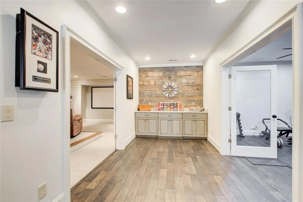 View into media room and exercise studio
