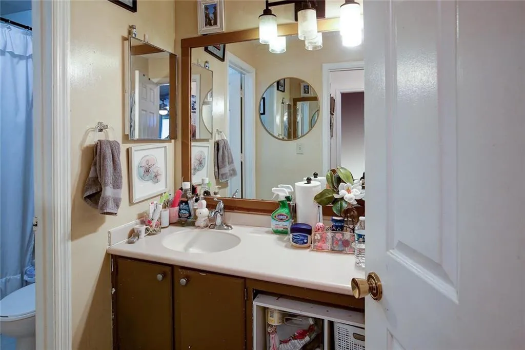Bathroom with vanity and toilet