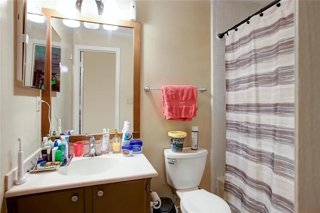 Bathroom with toilet and vanity