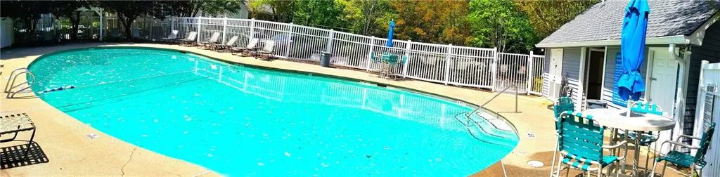 Community pool with fence