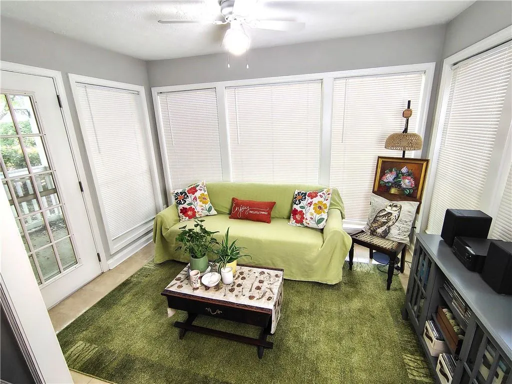 Lovely Sunroom Off Living Room.
