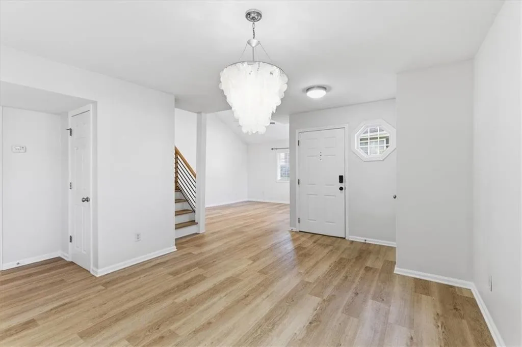 View across the dining room towards the front entry and living room.
