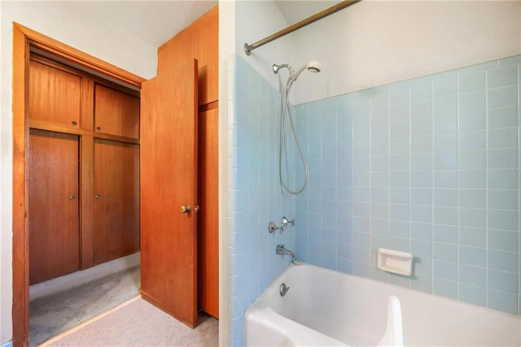 Bathroom with tub / shower combination