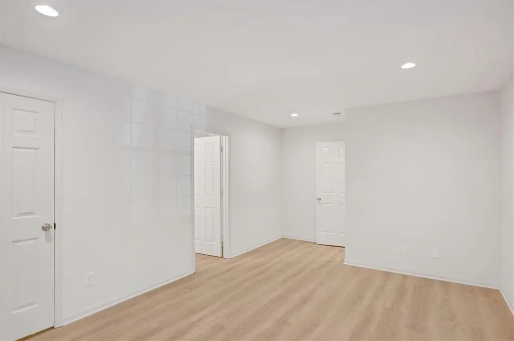 Spare room with light hardwood / wood-style floors