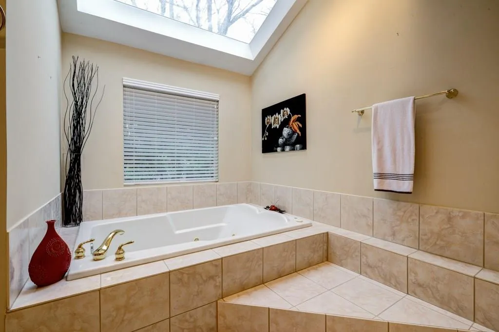 Separate shower and whirlpool tub