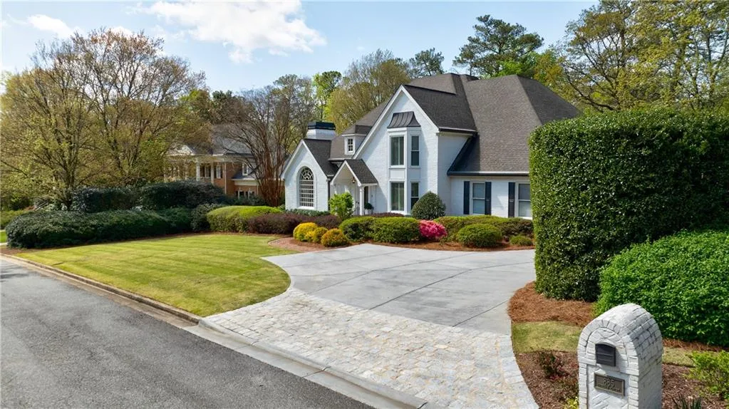 Front view with driveway