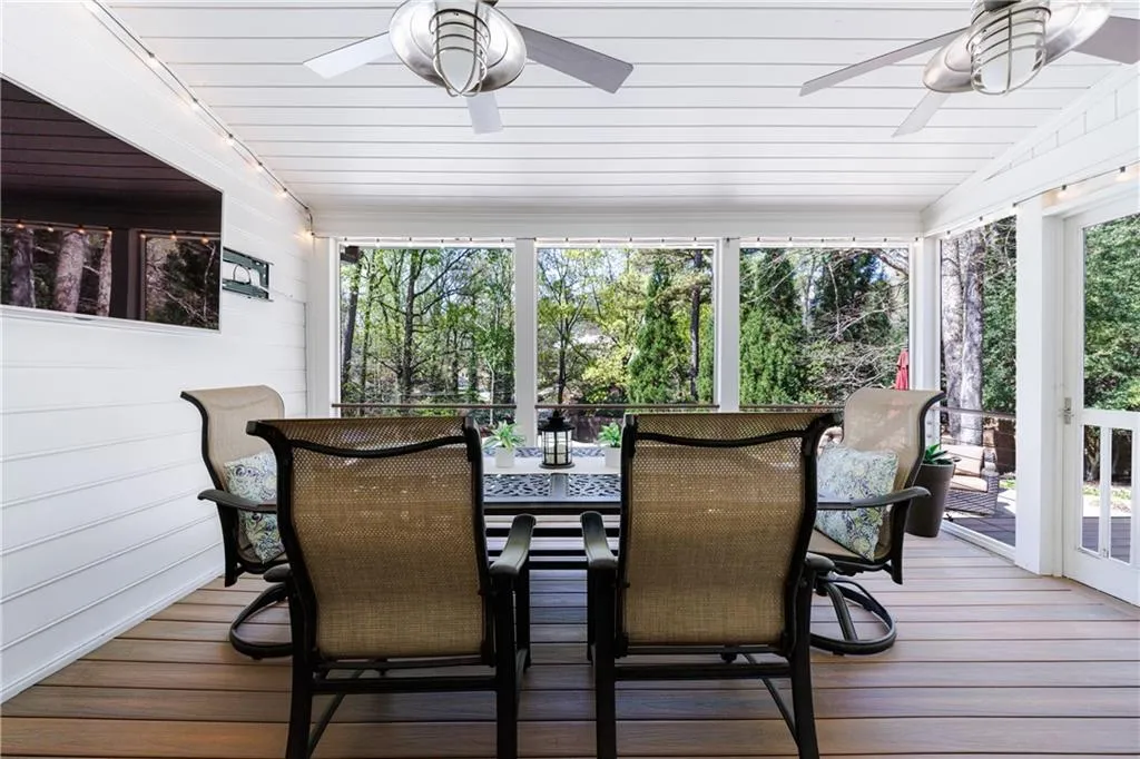 Screen porch with ceiling fans