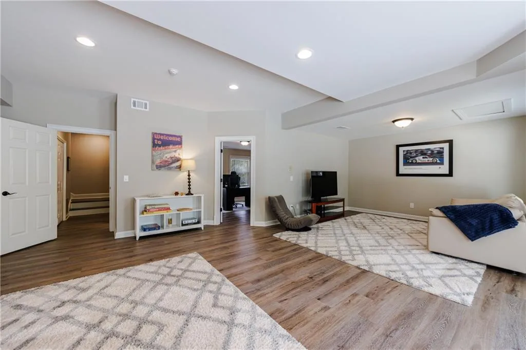 Living room with wood-style flooring
