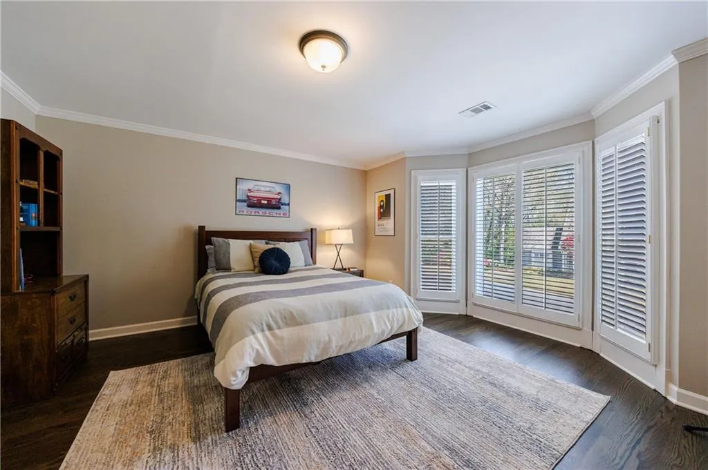 Upstairs bedroom with bay windows