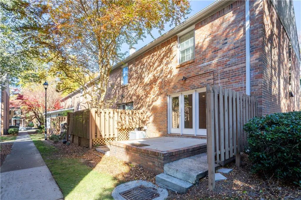 Concrete and brick patio right outside of Great Room