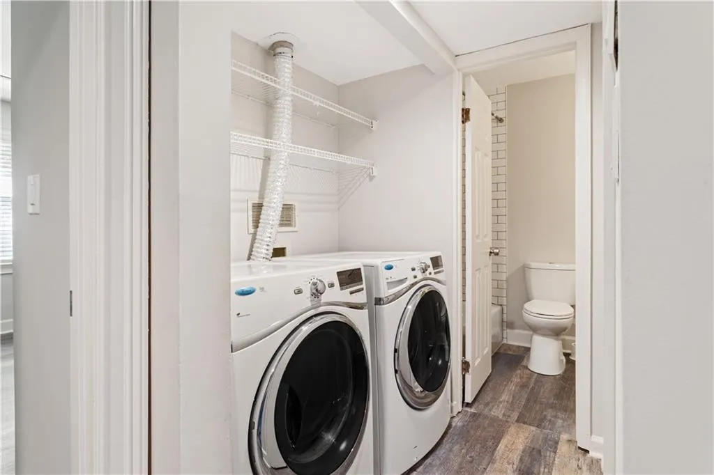 New Washer and Dryer located in Upstairs Hall, and remain with unit.