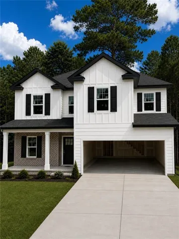 Two-story residence featuring white siding and black shutters, a covered front porch with brick accents, an attached garage, a paved driveway, and manicured landscaping