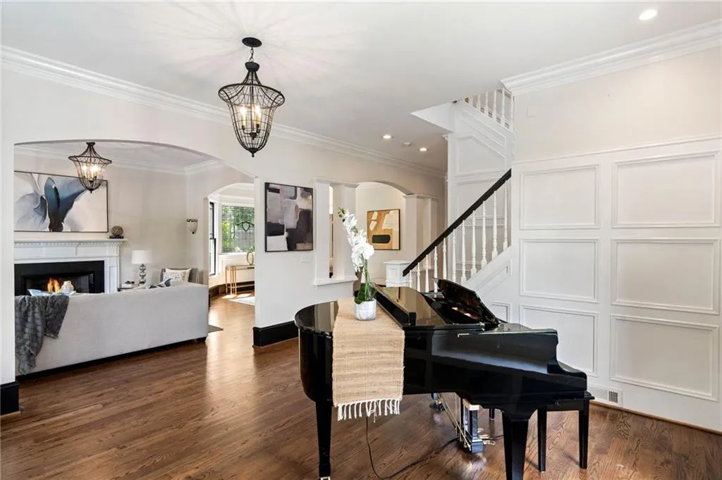 Entry and formal living room in the background. Did we mention the flawless hardwood floors!