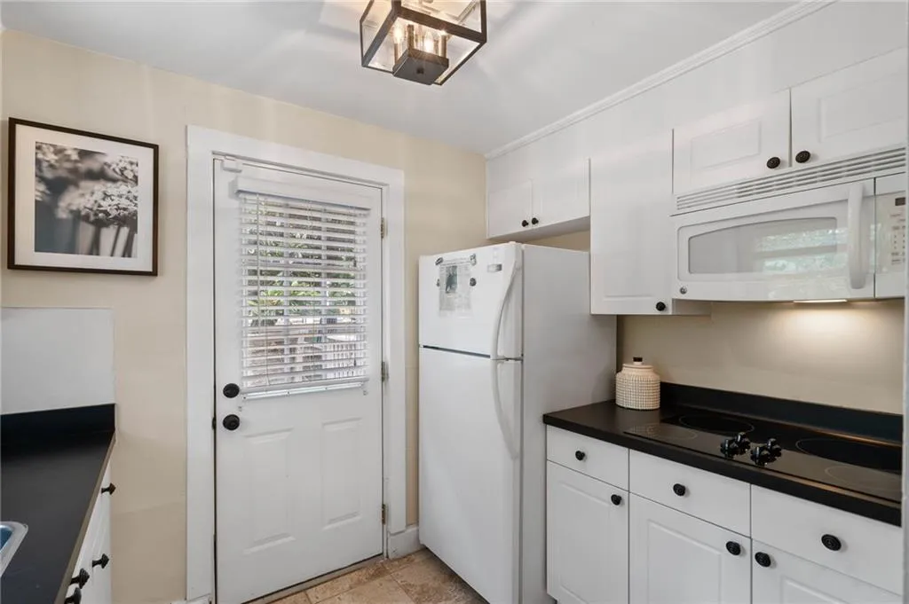 Carriage house kitchenette with access to a private sundeck!
