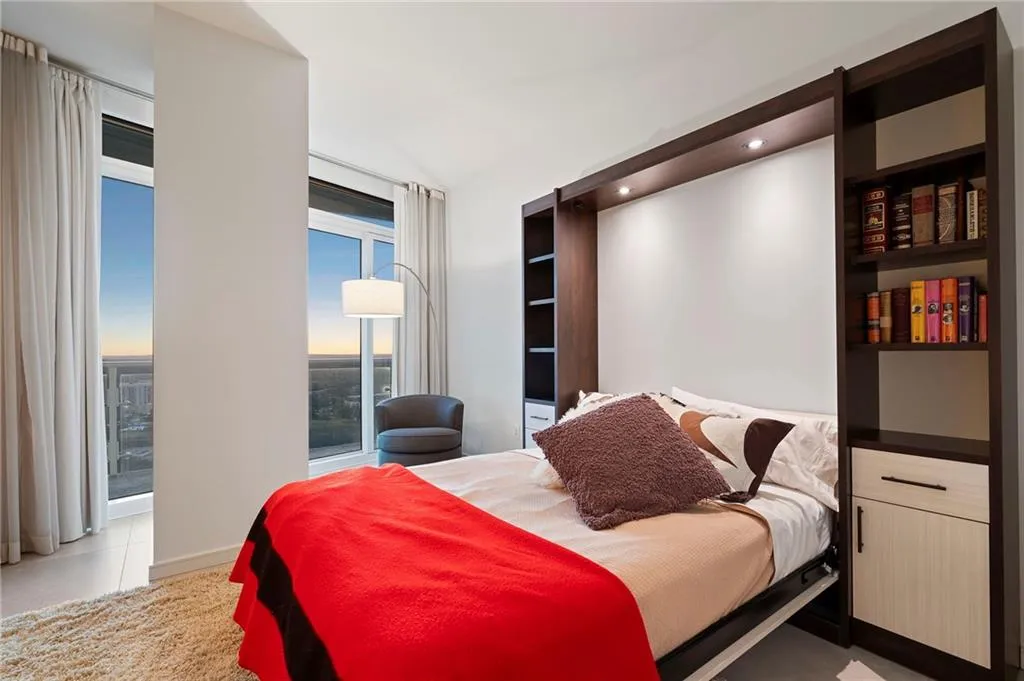 Bedroom featuring recessed lighting and light tile patterned flooring Bedroom featuring recessed lighting and light tile patterned flooring