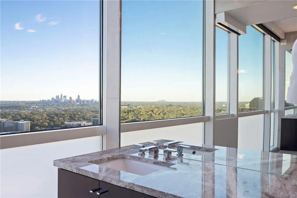 Bathroom with vanity and a view of skyline Bathroom with vanity and a view of skyline