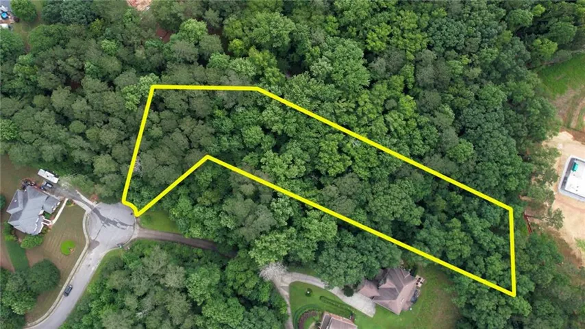 Aerial overview of property's location featuring property parcel outlined