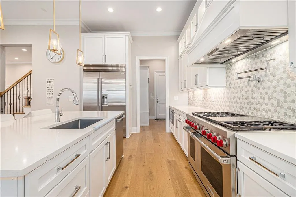 Appliances include a sub zero refrigerator & Wolf oven range.