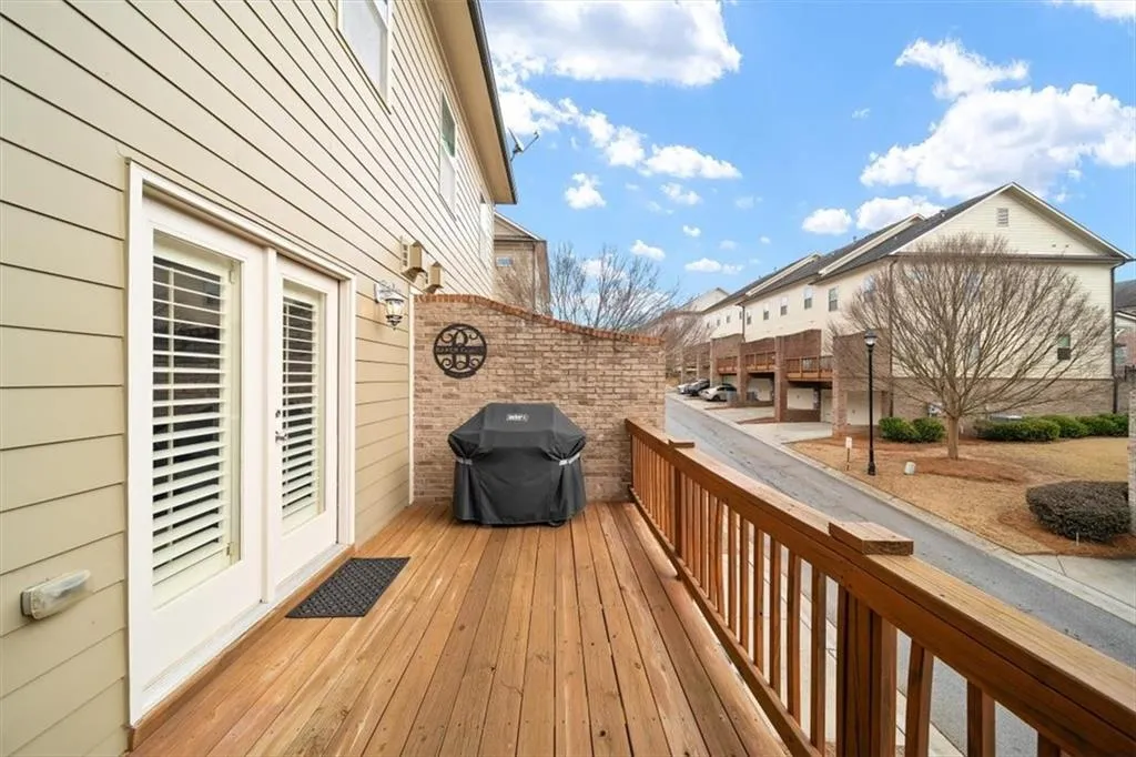 Wooden deck featuring grilling area