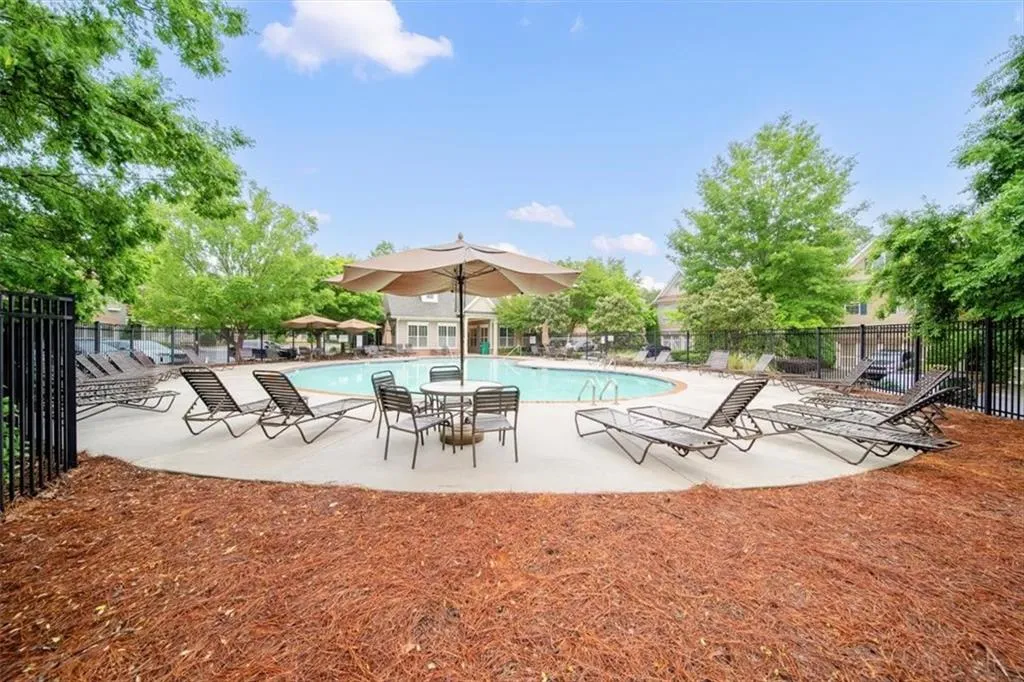 View of swimming pool with a patio