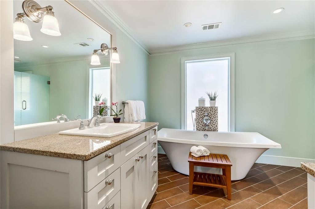 Custom Vanity & relaxing stylish Soaking Tub