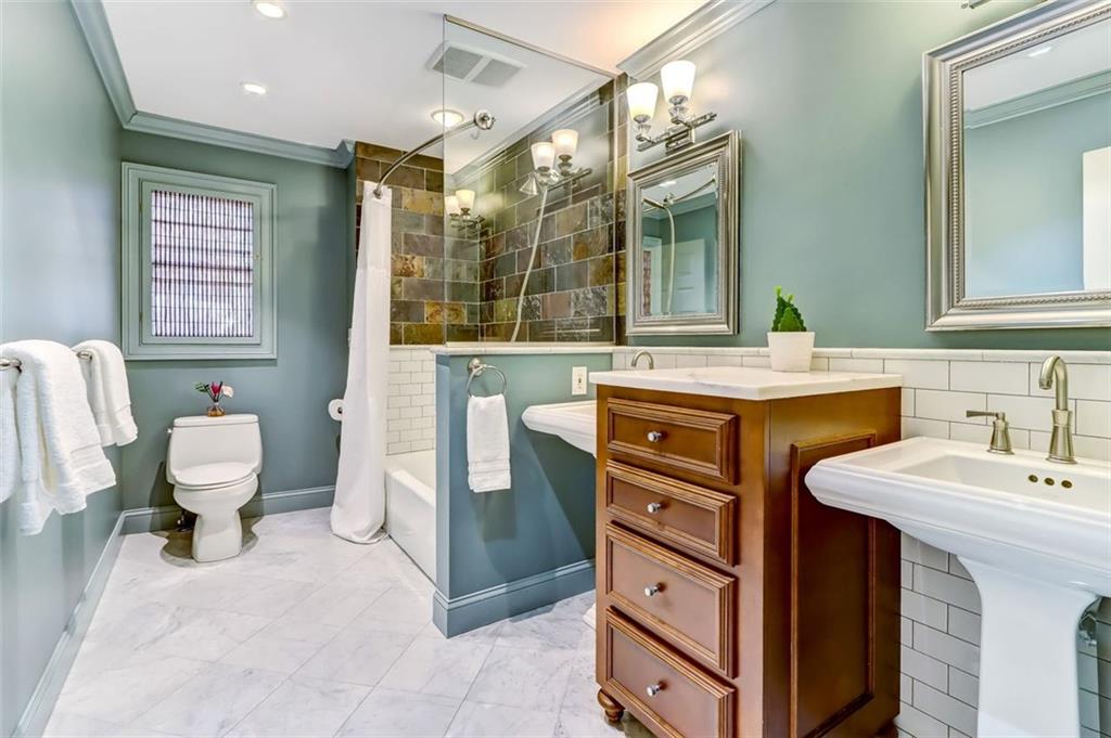 Perfect Hall Bath with Dual Sinks and Shower/Tub Combo