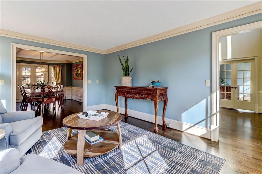 View of the flow from the foyer into the Living room and Dining room