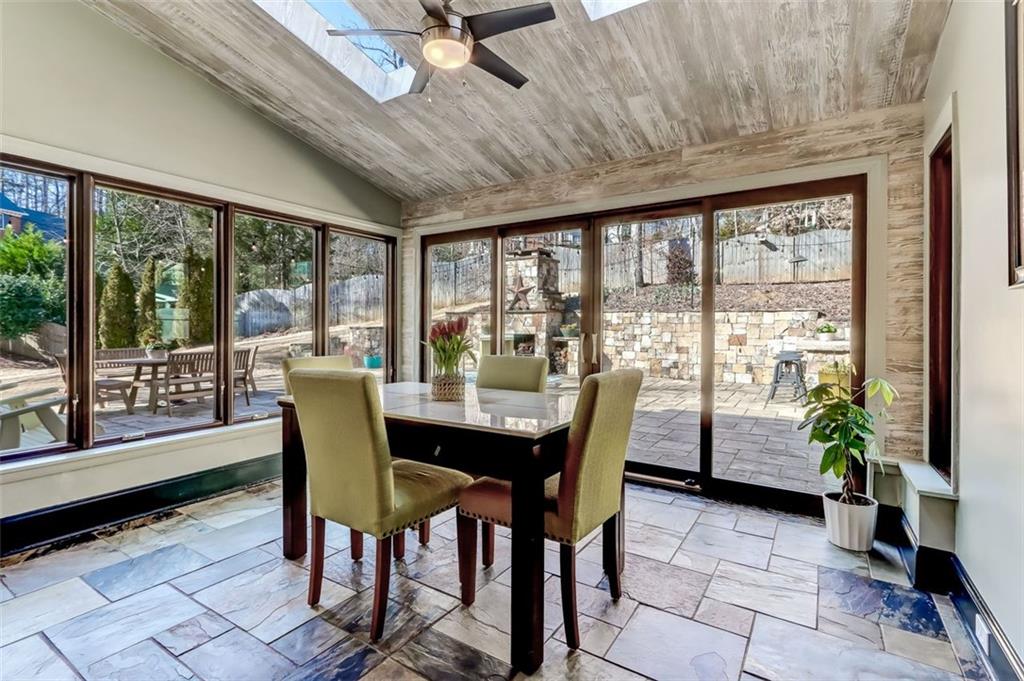 Notice the tile flooring and stepless walkout to the backyard patio area