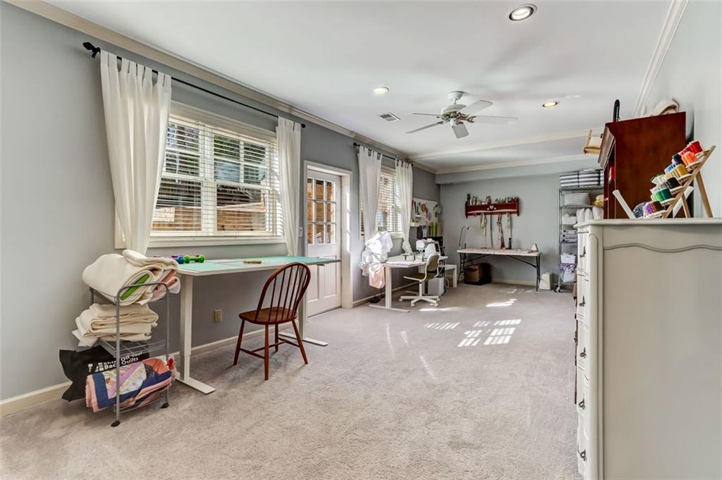 New carpeting and fabulous daylight make this a perfect place to Quilt
