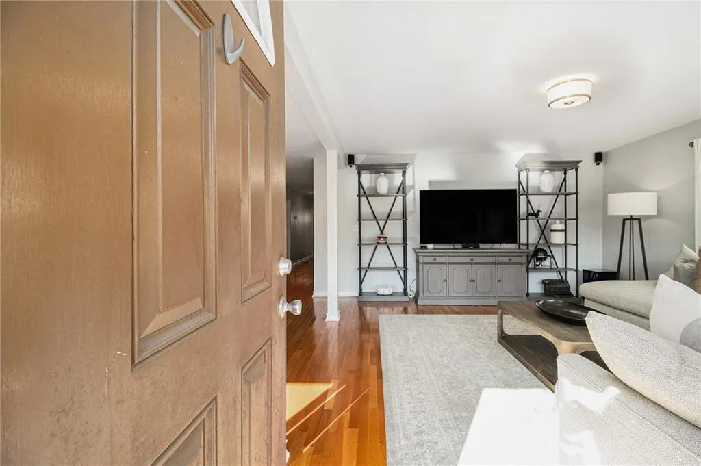 Living area featuring wood finished floors
