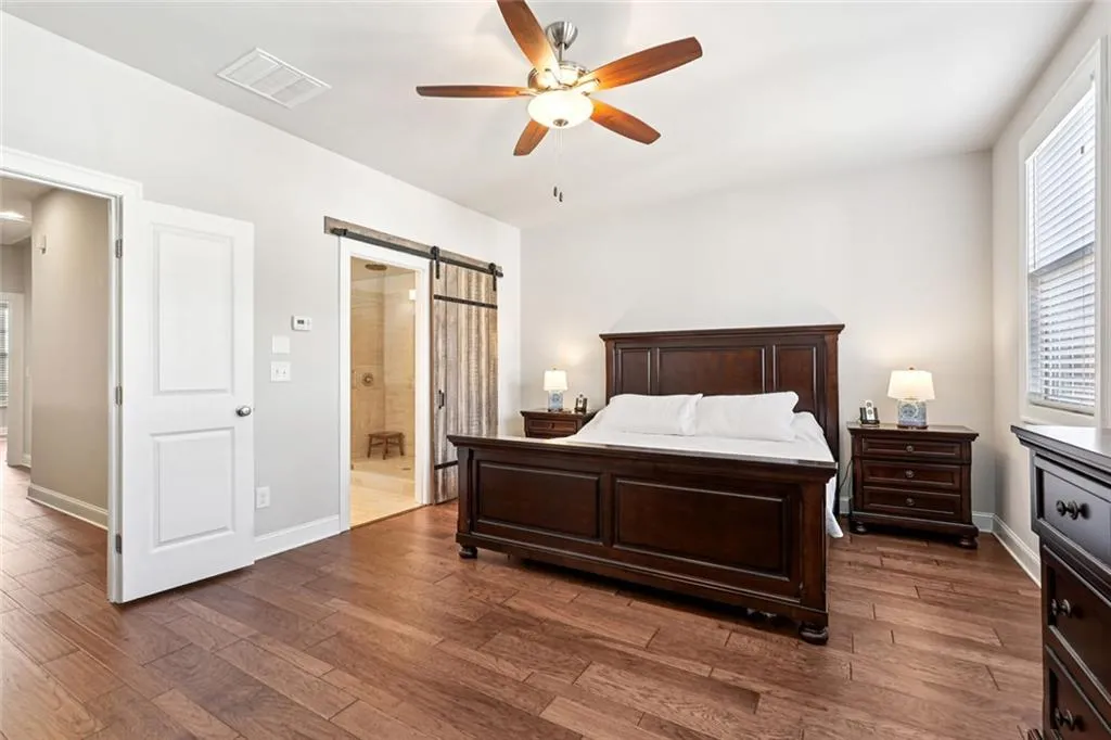Primary bedroom leading to bathroom