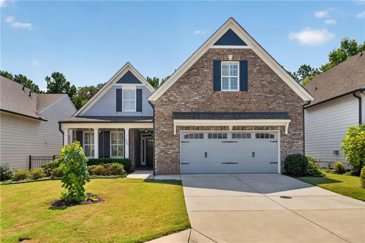 Brick and siding exterior with gabled roof lines