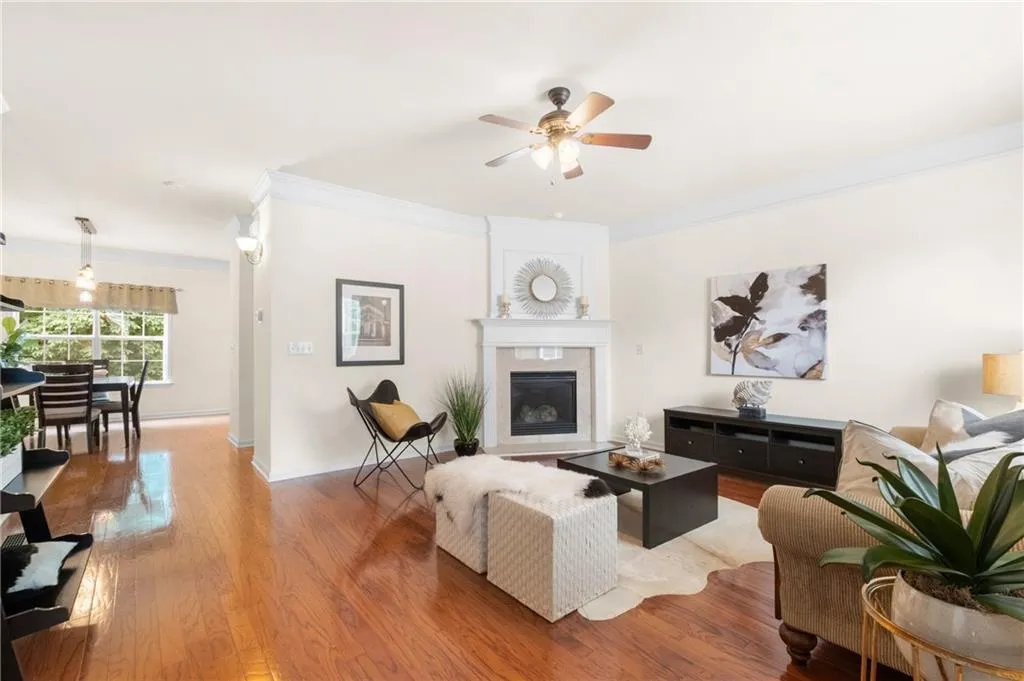 View from the spacious great room into the dining area that flows into the kitchen