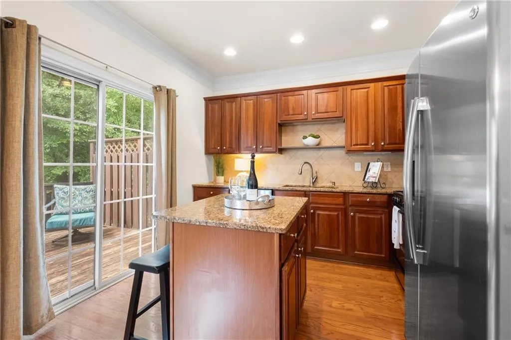 Another view with sliding doors leading to a large deck