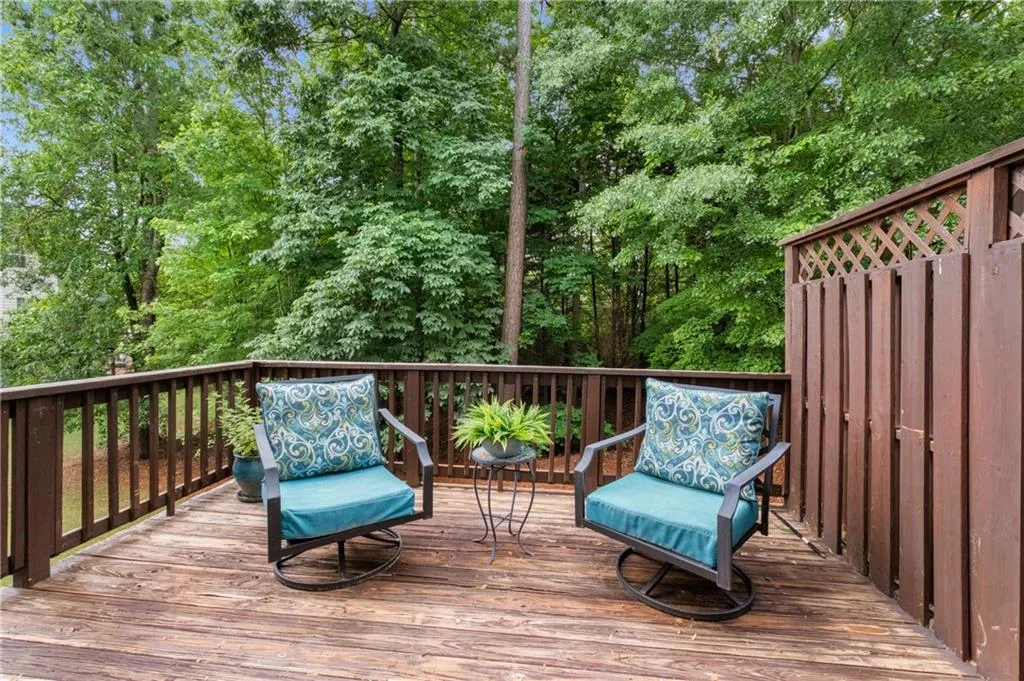 Deck overlooks a private wooded area. The deck is scheduled to be re-stained.