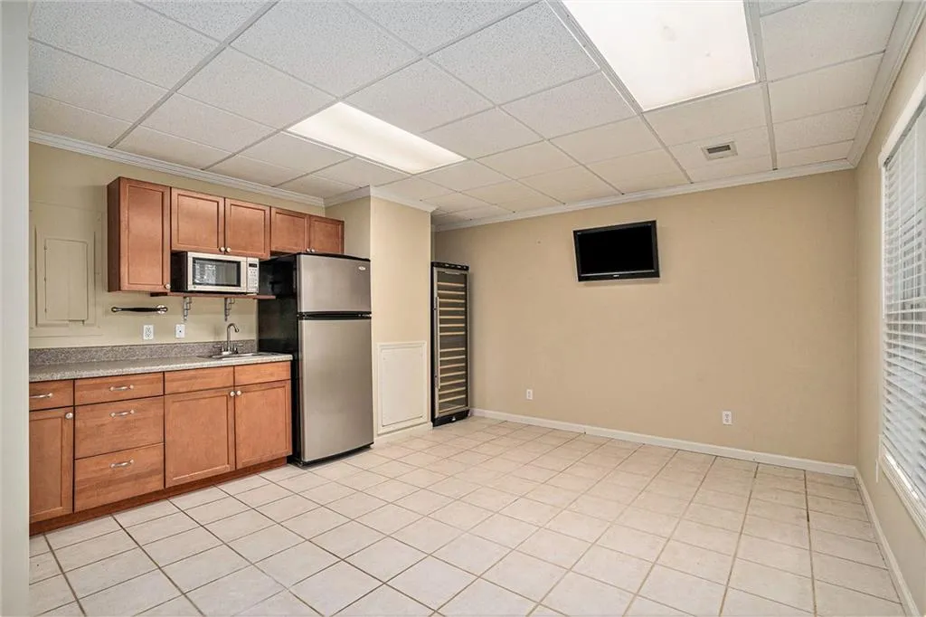 Kitchenette on terrace level has a wine cooler