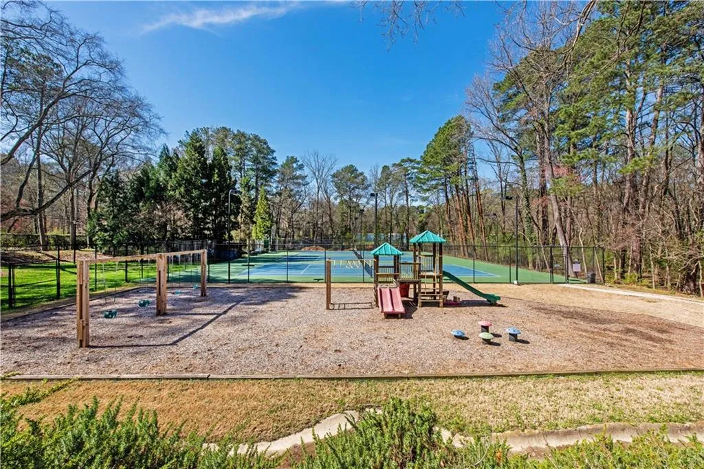 Communal playground with a tennis court
