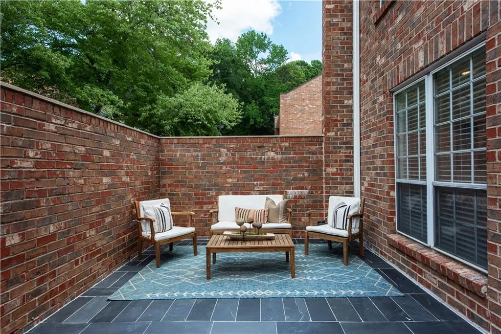 View of patio with an outdoor living space