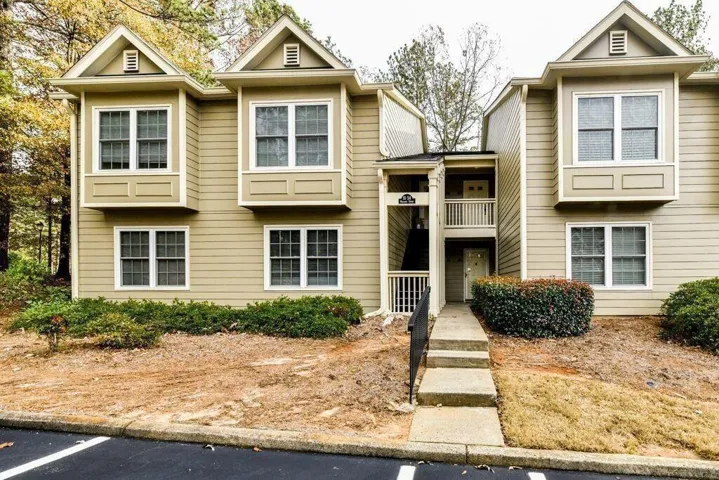 Townhome / multi-family property featuring a balcony