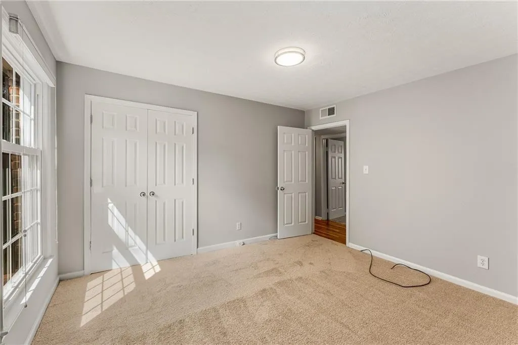 New carpet & pad, paint, light fixture, window blind, double closet.