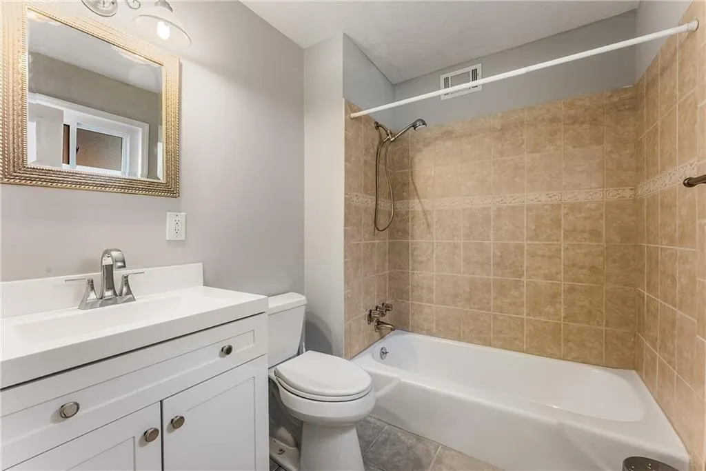 New sink & cabinet, faucet, lighting.