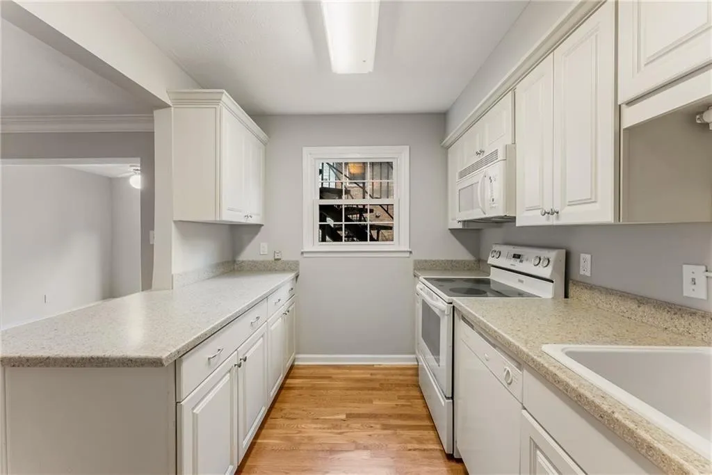 Great cabinet and counter space. Refinished hardwood floor.