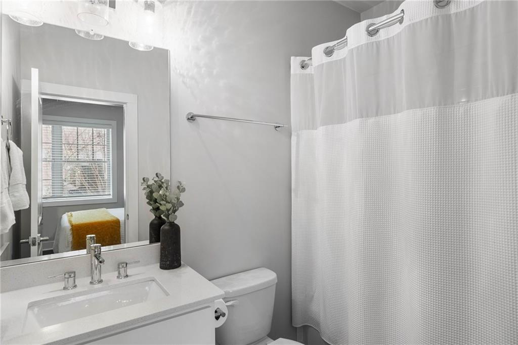 Bathroom with toilet and vanity