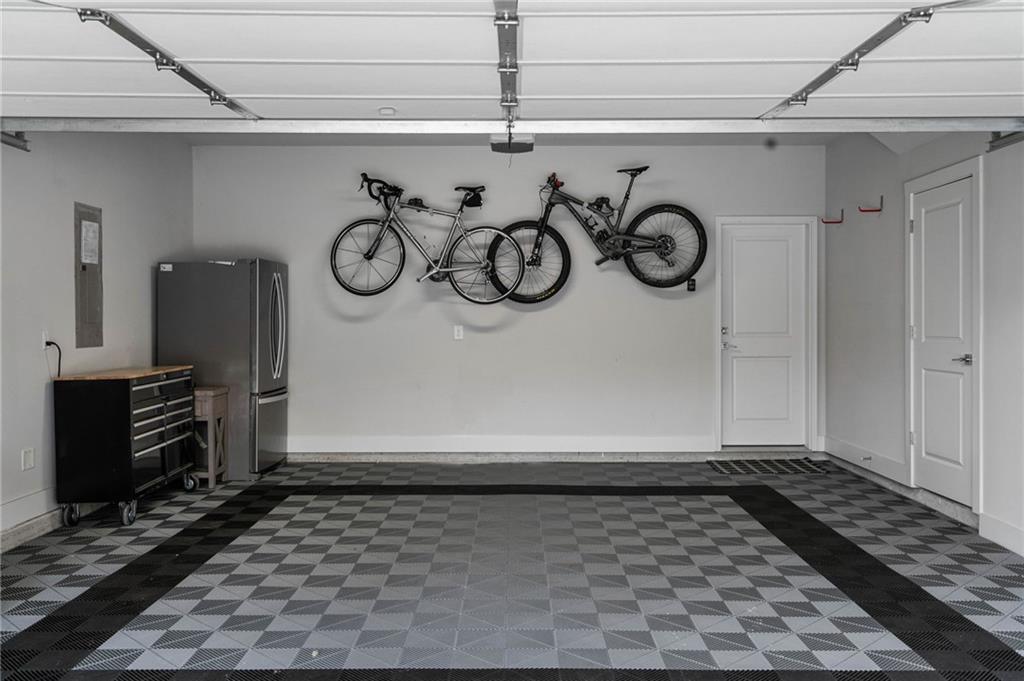 Garage with stainless steel fridge