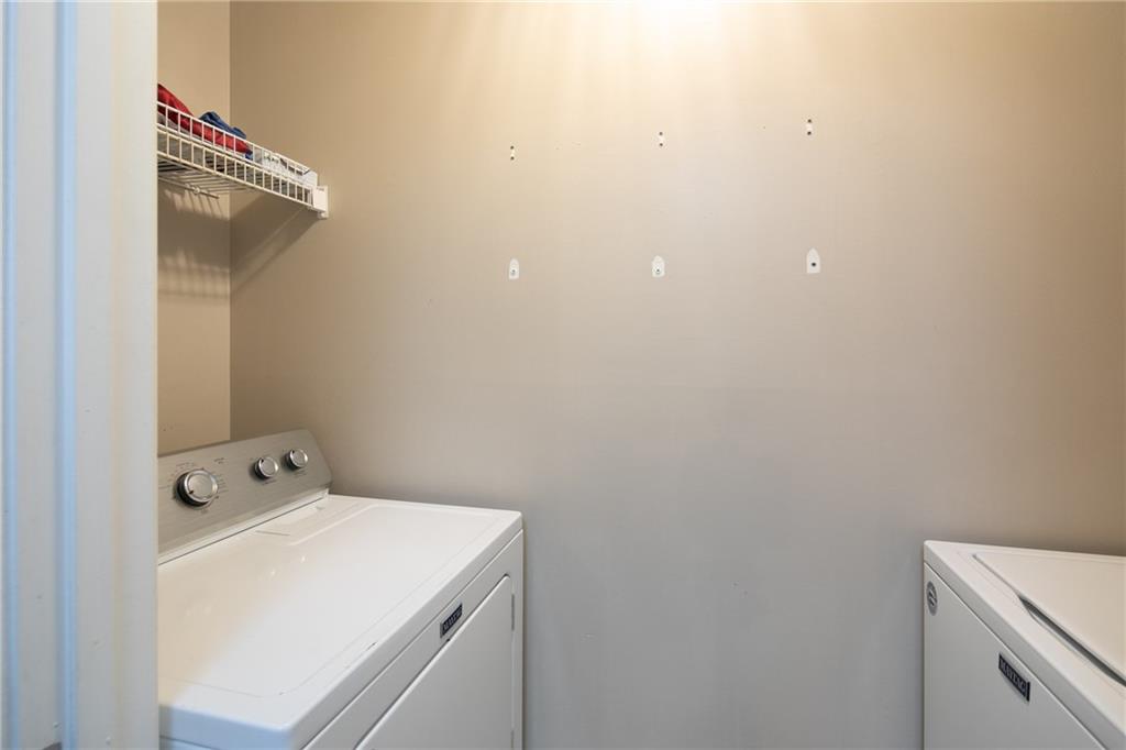 Laundry area featuring independent washer and dryer
